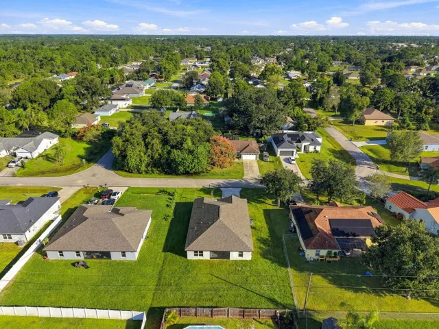 Aerial view of the backyard and roofline.