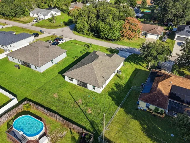 Wide aerial of the surrounding Palm Bay neighborhood.