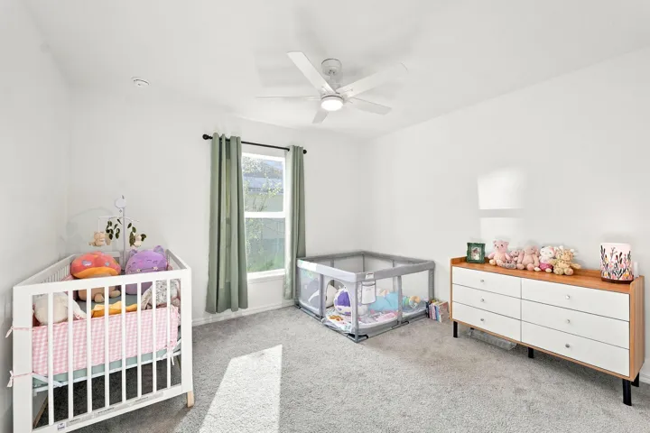 Bedroom currently set up as a nursery.