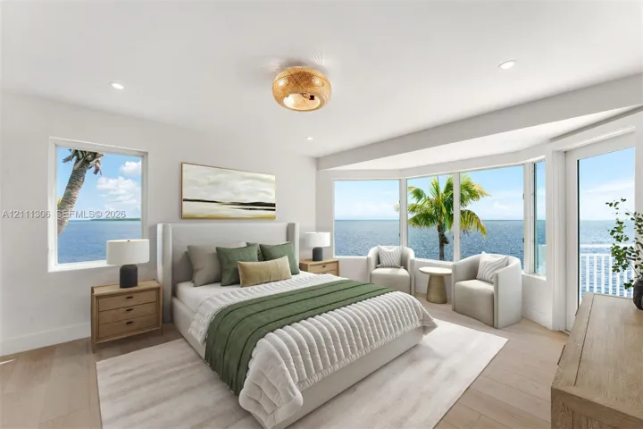 Bedroom featuring wood-finish flooring, recessed lighting, a textured semi-flush mount fixture, multi-pane bay windows, and a glass-paneled door