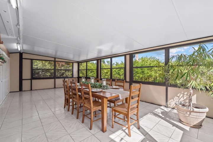 LARGE ENLCOED PATIO