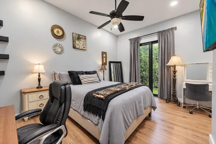 Staged Neutral Bedroom with Garden Views