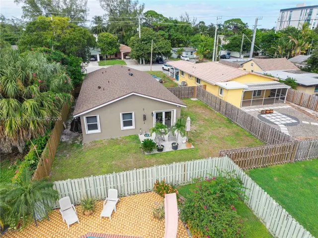Fenced backyard featuring a concrete patio, enough room to add an in-ground pool