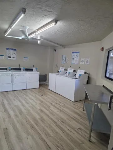 COMMUNITY LAUNDRYROOM, 3 WASHERS/3DRYERS ON EACH FLOOR