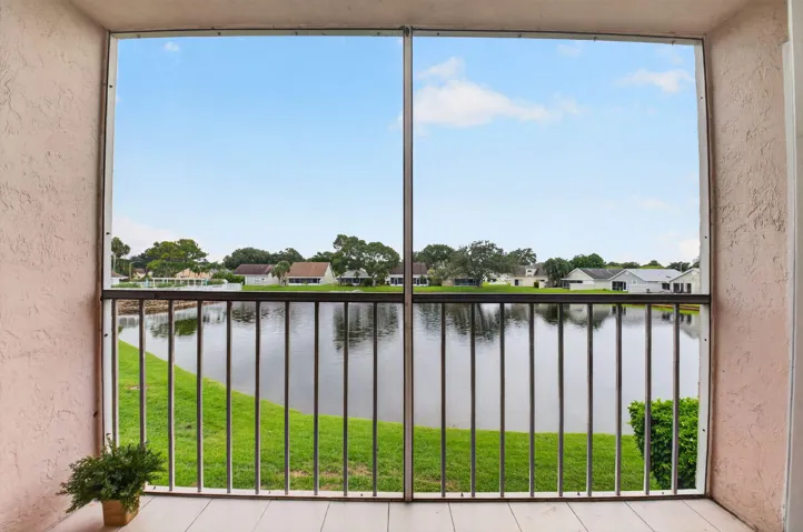 View of lake and fountain from balcony.