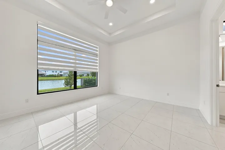 Primary suite with lakefront views
