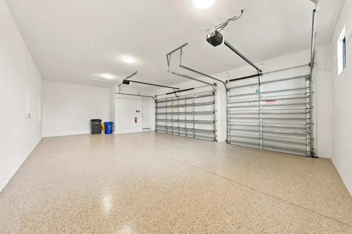 3 car garage with epoxy floors
