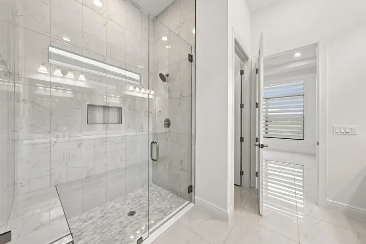 Primary bathroom with upgraded 96inch glass frameless shower satin nickel finishes