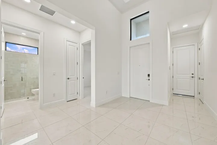 Entry, garage entry, 3rd bedroom and 3rd bathroom