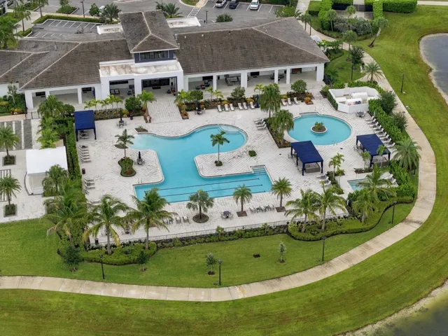 Cresswind clubhouse zero entry resort style pool with lap area, resistance pool, hot tub and cabanas