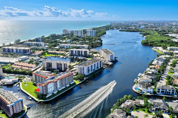 Aerial perspective of coastal multi-story residential building featuring waterfront positioning, expansive waterway exposure, and proximity to​​‌​​​​‌​​‌‌​‌‌​​​‌‌​‌​‌​‌​​​‌​​ shoreline