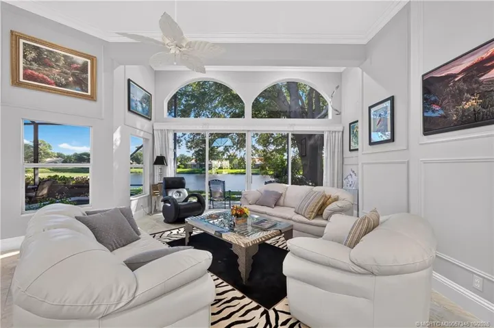 Expanded Living Room with golf & water views.