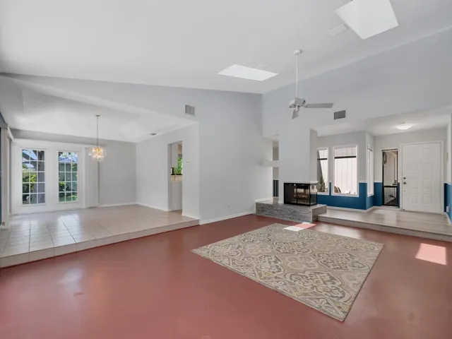 LIVING ROOM VIEW TO FOYER