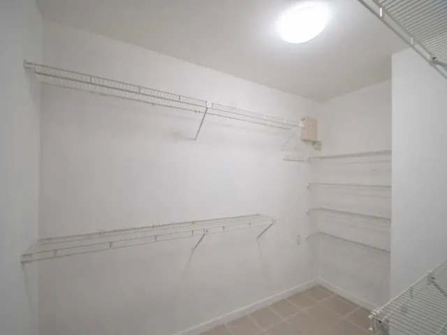 OWNERS WALK IN CLOSET