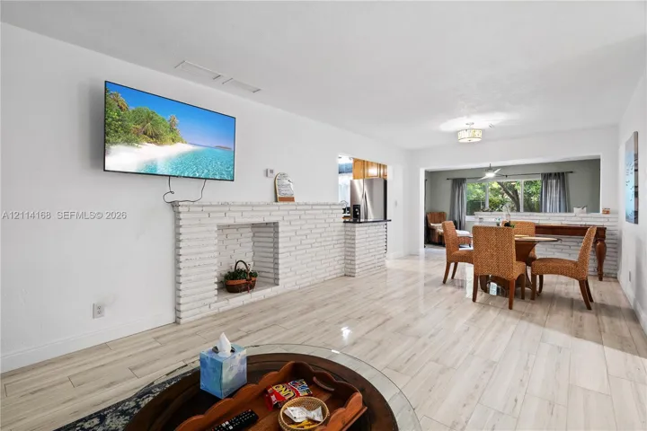 Open living area and a large window providing natural light