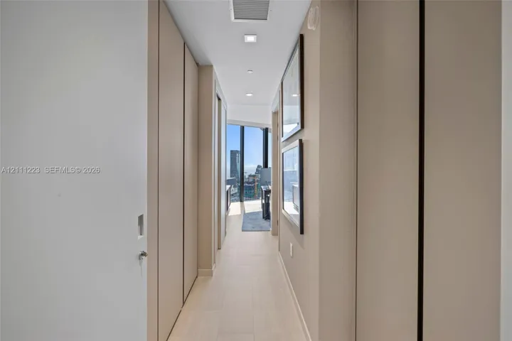 Entrance to 3rd bedroom - closets left & right side