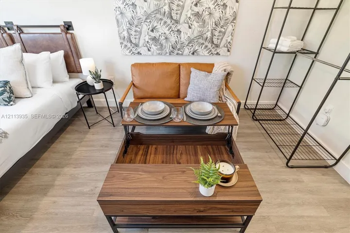 Interior space featuring wood-finish flooring and neutral wall color