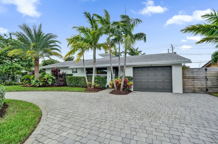 Front of home, 1 car garage.