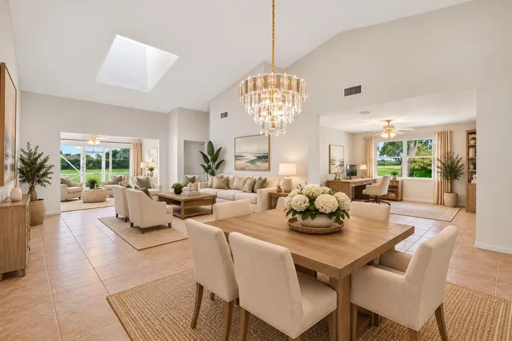 Dining Room, Living Room and den. Virtually staged so you can see the potential.