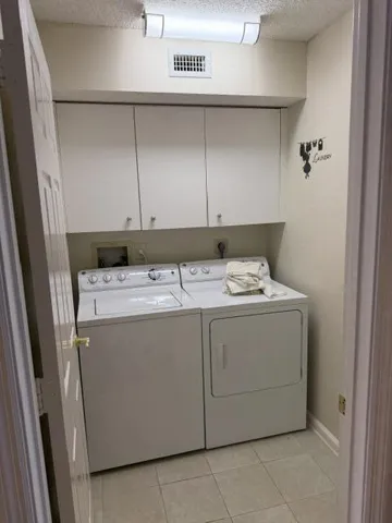 Laundry room inside the unit