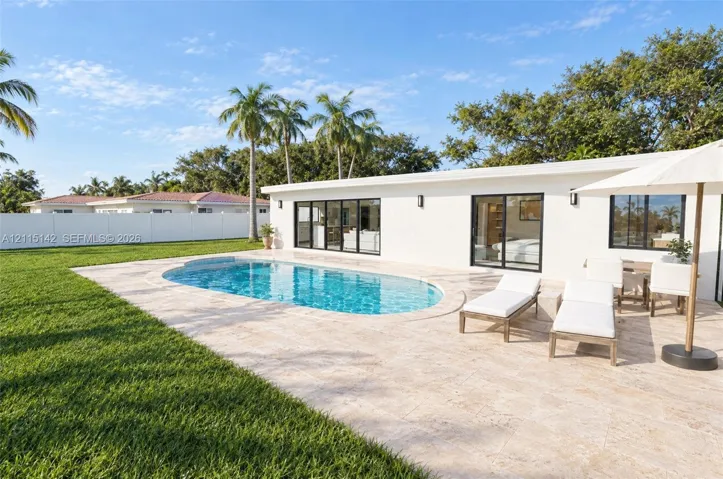 VIRTUAL RENDERING, NOT AN ACTUAL PHOTO. HOME IS UNDER CONSTRUCTION. Backyard and pool shown as proposed per permitted plans; final construction, finishes, landscaping and furnishings may differ. Buyer to verify with developer.