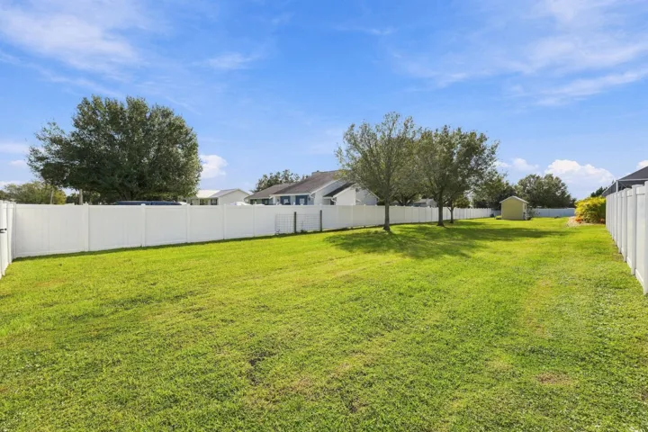 Large Fenced Yard with Mature Trees