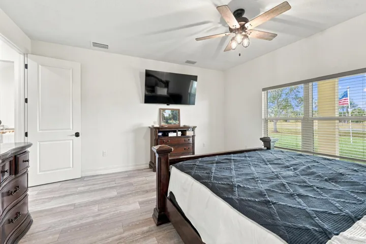 Bright Bedroom with Backyard Views
