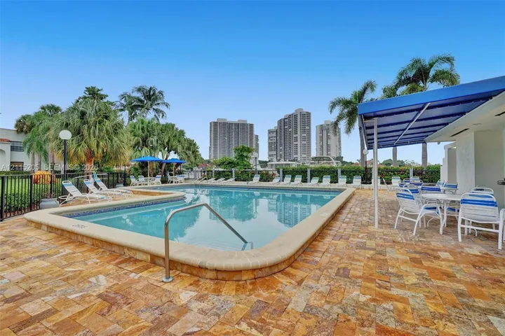 Heated community pool overlooking the Waterways marina.