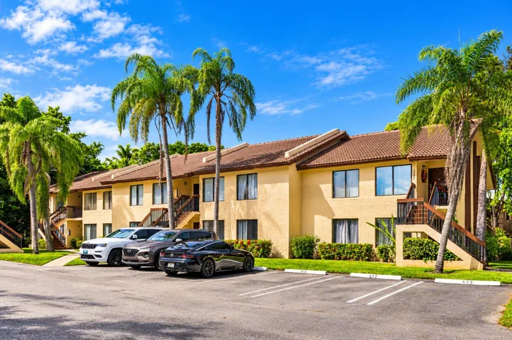 Tropical Palm-Side Apartment Complex