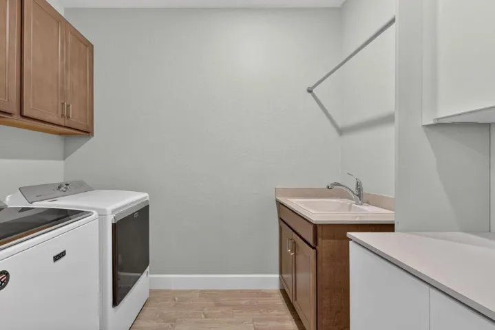 AMPLE ROOM AND STORAGE IN YOUR LAUNDRY TO KEEP YOU ORGANIZED