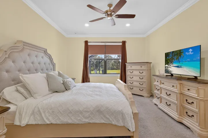 When the gathering winds down, warm tones, soft carpeting and a view toward the backyard invite you to settle in