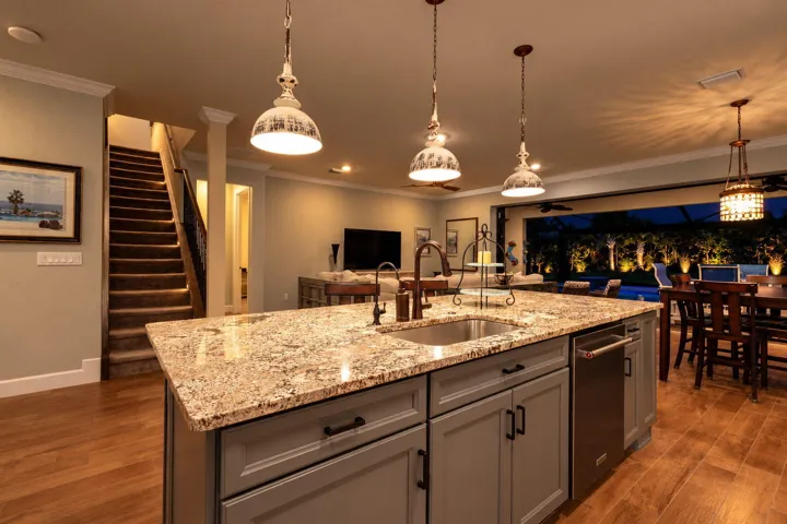 Beneath ten-foot ceilings, cooking, dining and relaxing come together in one gracious gathering space