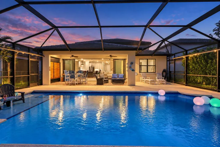 The pool glows, the conversation lingers, and nobody is quite ready to call it a night.