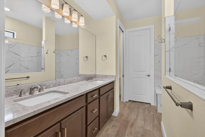 PRIMARY BATH GETS YOUR DAY STARTED AND SOOTHES YOU TO FINISH EACH GLORIUS DAY
