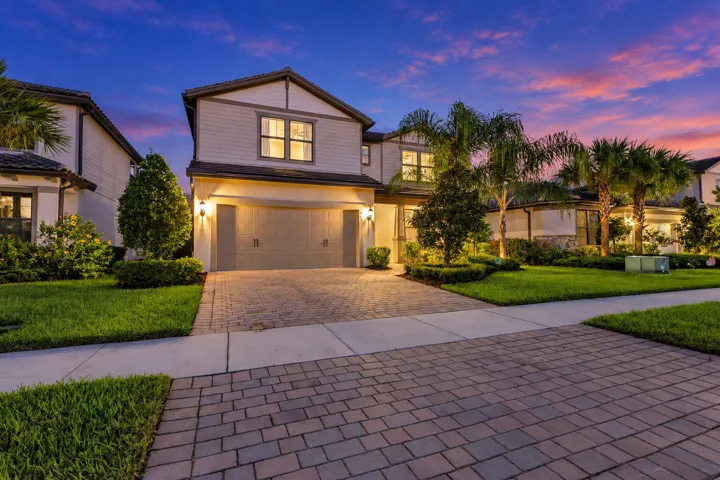 Craftsman-inspired details and softly lit palms make coming home feel like the best part of the day