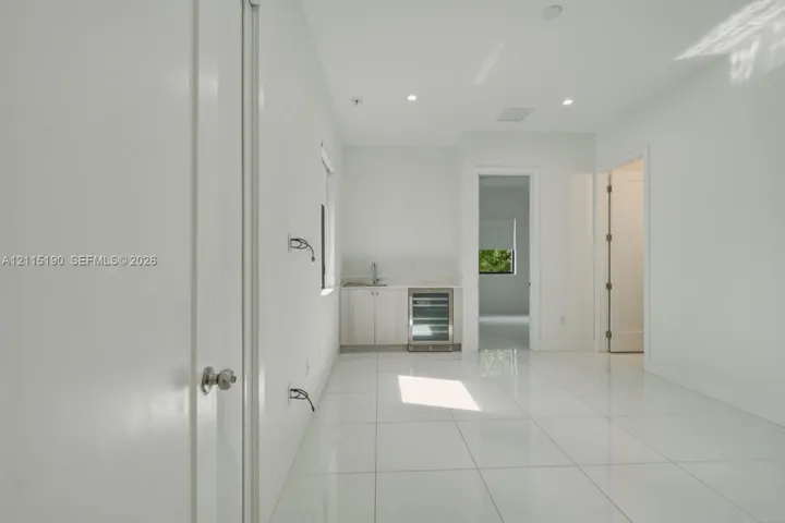 Additional interior area with wet bar.