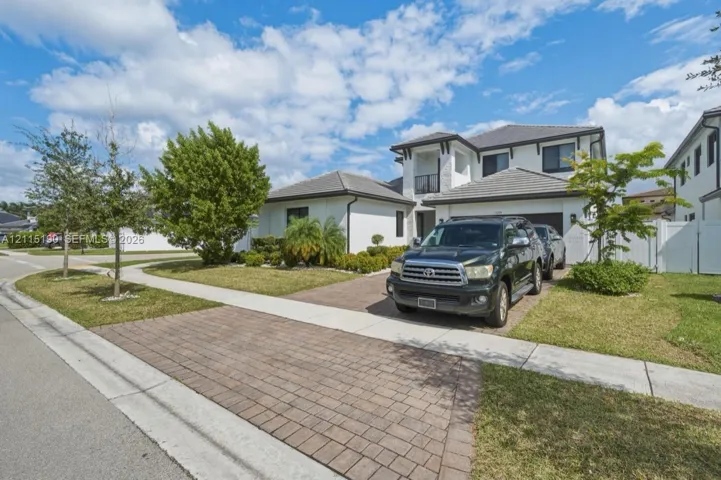 Angled front exterior and driveway.
