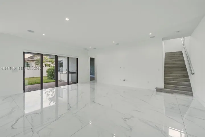 Main living area with sliding doors to the patio.