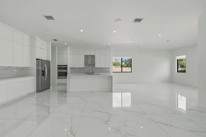 Kitchen and adjacent dining area.