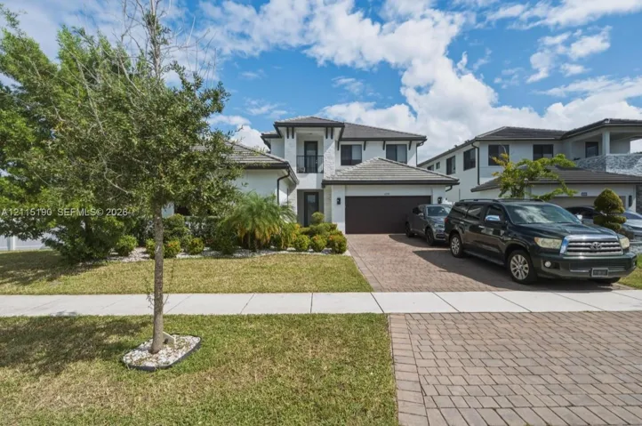 Front exterior and driveway.