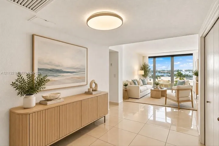 Polished stone tile flooring, neutral wall tones, low-profile circular LED flush-mount lighting, and floor-to-ceiling glass panel windows
