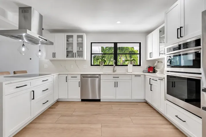 Bright Modern Kitchen with Stainless Dis