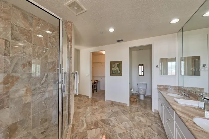 Master bath with large closet