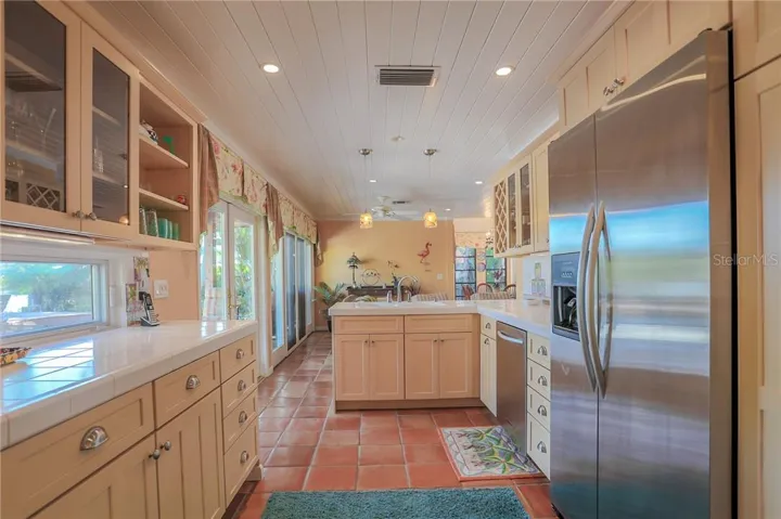 Kitchen with pass through to patio