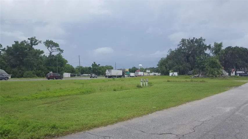 South end of property on SE 62nd looking across the property at Hwy 301 heading towards the merge of 441/301 &27.