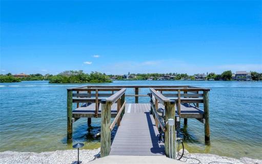 Enjoy fishing or gathering with neighbors for happy hour