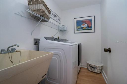 A new washer and dryer are located in the unit.