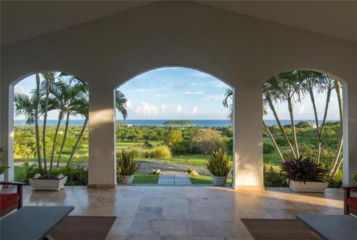 El Cerro Main House covered terrace looking out to Esperanza and the islands
