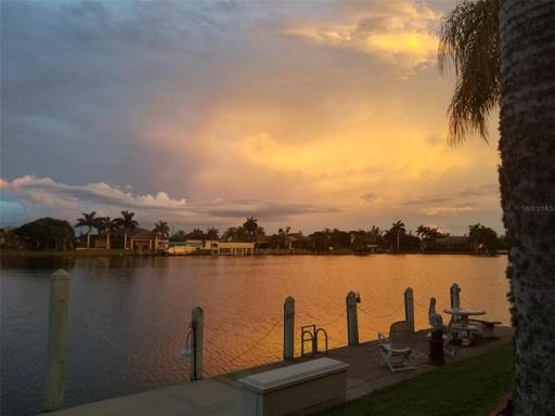 Looking down the canal at sunset from adjacent house.  This could be YOUR view too!