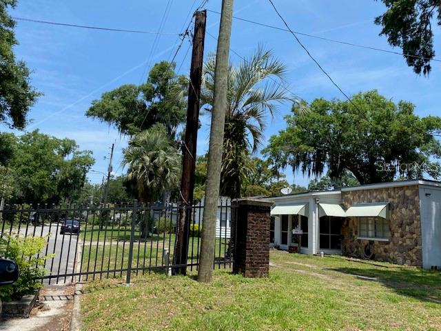 Residential neighbors on other side of fence.